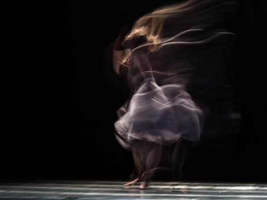An artistic image of a woman dancing